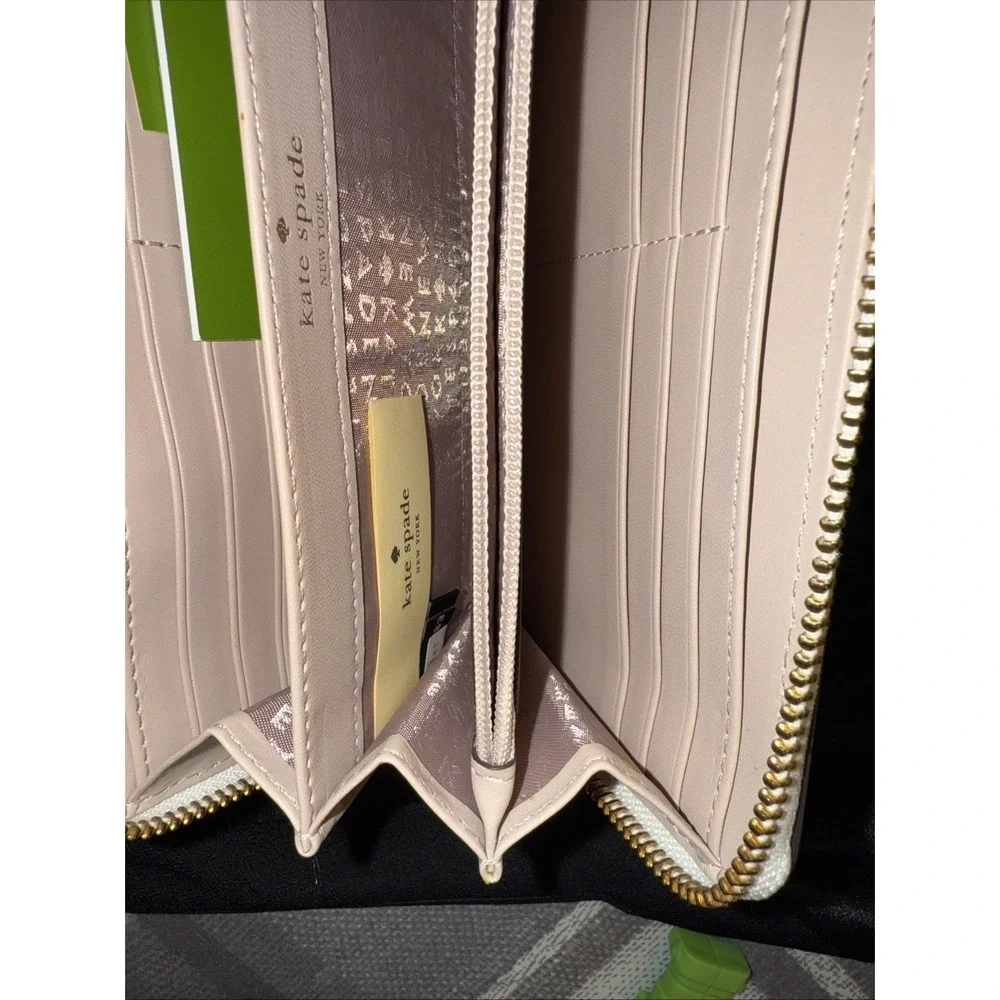 KATE SPADE large zip around white and tan wallet brand new